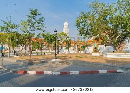 Wat Rakhang Khositaram, A Buddhist Temple Stupa At Noon With Blue Sky In Bangkok City, Thailand. Tha