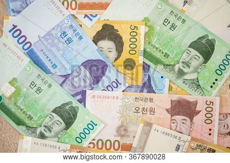 Current Use Of South Korean Won Currency In Different Value. Various Bank Notes Placed. South Korean