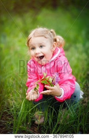 Vertical Picture Of Beautiful Little Playful 3 Years Old Girl With Happy Face, Pretty Eyes, Blonde H