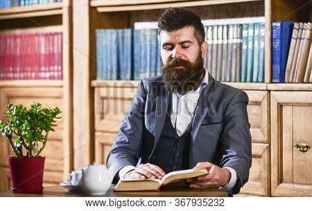 Aristocrat On Thoughtful Face Reading Book. Aristocratic Lifestyle Concept.