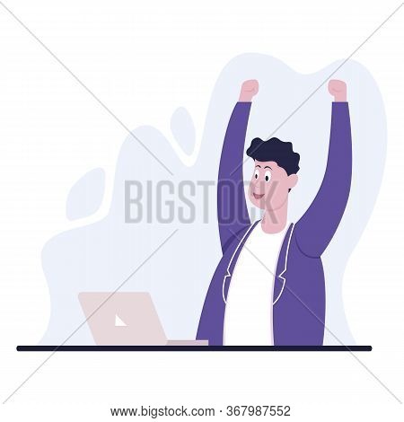 Businessman Sitting At Office Desk. He Is Looking At The Laptop And Raised His Hands In Victory. The