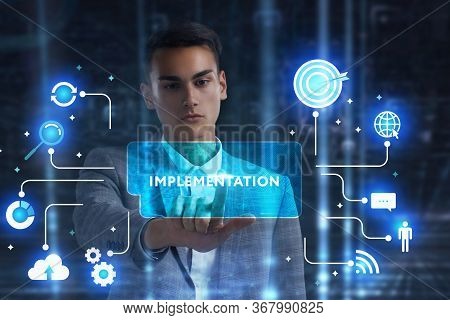The Concept Of Business, Technology, The Internet And The Network. A Young Entrepreneur Working On A