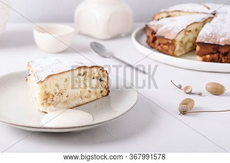 Homemade Simple Apple Cake Or Pie Sliced And Sprinkled Powdered Sugar On Grey Concrete Table Decorat