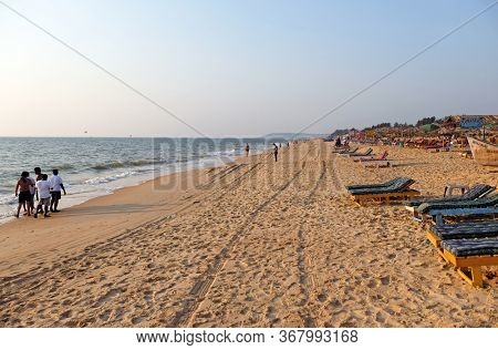 CANDOLIM, INDIA - FEBRUARY 18, 2020: Candolim Beach, North Goa, India