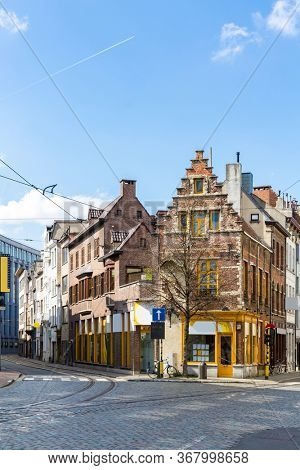 Cityscape of Meir shopping street road in Antwerp downtown in Belgium with tram track. EU Begium city landmark and shopping center for tourism and travel destination concept.