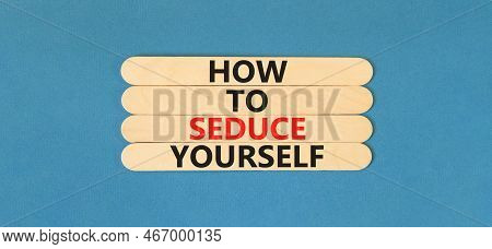 How To Seduce Yourself Symbol. Concept Word How To Seduce Yourself On Wooden Sticks. Beautiful Blue 