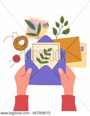 Postal Envelopes In Hands. Human Arms Write Letters And Sign Postcards. Table Top View. Sending Invi