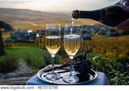 Tasting Of Premier Cru Sparkling White Wine With Bubbles Champagne On Outdoor Terrace With View On C