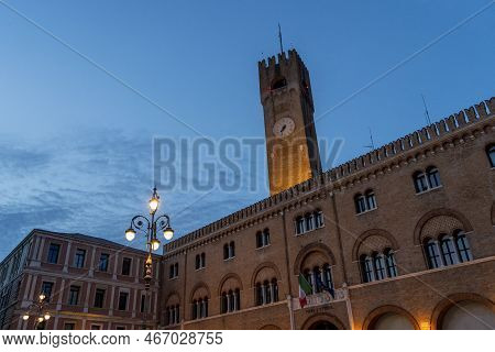Watch Tower In The City Center Of Treviso, Italy. Beautiful Piazza Dei Signori Is The Palazzo Dei Tr