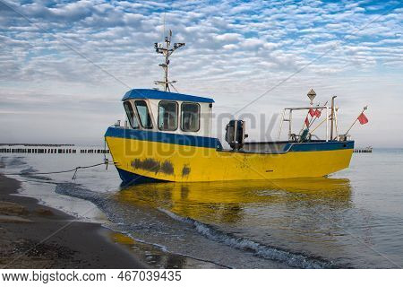 Homecoming: Tired Fishermans Ship Approaching After A Hard Day. Rewal, Baltic Sea, Poland