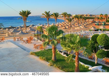 Idylic Beach With Palms And Sun Umbrelas, Red Sea, Egypt