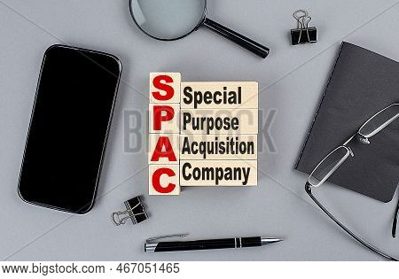 Wooden Cubes Spac Wtih Notebook , Magnifier And Smartphone, Business