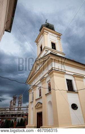 Main Facade Of Vojlovica Monastery, In Pancevo, Serbia, Surrounded By The Refinery (rafinerija). Als
