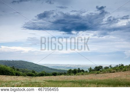 Aerial Panorama Of Plains Of Vojvodina, In Serbia, During A Cloudy Afternoon, Seen From The Vrsacki 