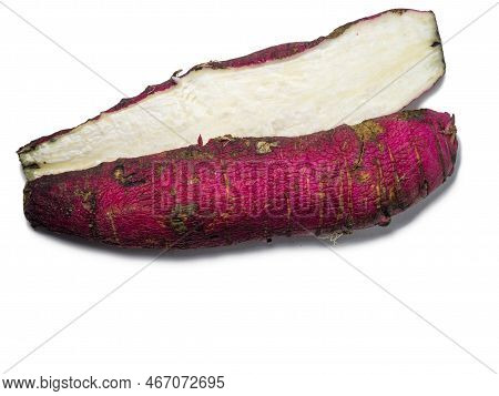 A Long Ugly Radish Cut In Half. Radish Variety. Red Root Crop Cracked. Wrinkled Root. Salad Ingredie