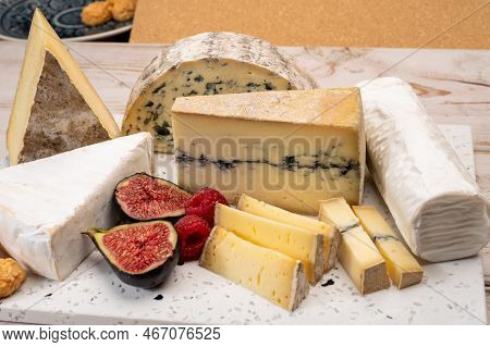 Cheese Collection, Marble Board With French Cheeses Brie, Tomme, Matured Goat Cheese, Morbier  Serve
