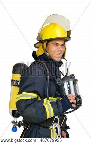 Young Smiling African American Fireman With Respirator And Air Breathing Apparatus On His Back In Pr