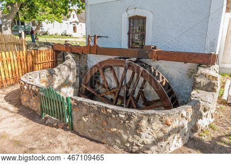 Elim, South Africa - Sep 21, 2022: The Water Furrow And The Water Wheel At The Mill In Elim, In The 