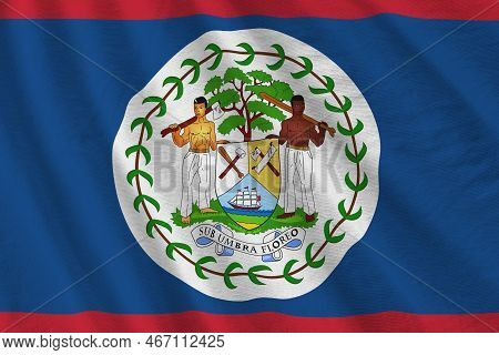 Belize Flag With Big Folds Waving Close Up Under The Studio Light Indoors. The Official Symbols And 