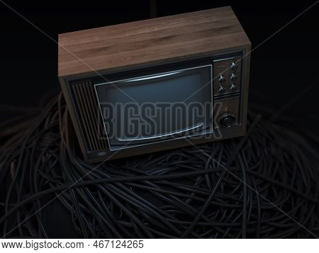 A Vintage 80's Television Perched On A Jumbled Pile Of Black Cables On A Dark Omnious Background - 3