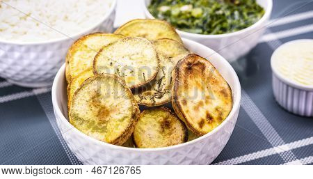 Pot Of Fried Or Baked Sweet Potatoes, Sliced ​​and Served Hot, Typical Food From Brazil