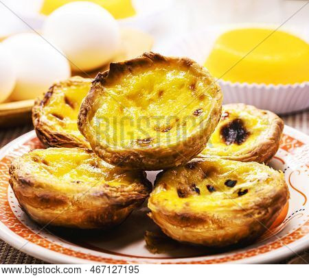 Pastel De Nata, Called Pastel De Belem, Traditional Portuguese Crunchy And Sour Sweet Made With Eggs