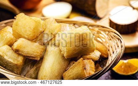 Fried Cassava, Root Served Peeled And Fry. Piece Of Raw Cassava In The Background, Homemade Food Fro