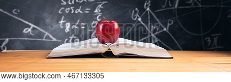 The Apple On Book With Blackborad Background