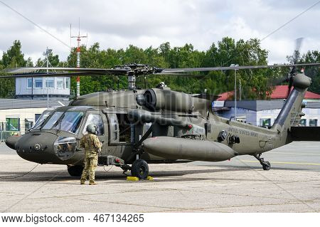 Liepaja, Latvia - August 7, 2022: Us Army Sikorsky Uh-60 Black Hawk Military Helicopter With Crew Af