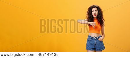 Party For Losers I Am Out. Dissatisfied Attractive Popular Girl With Curly Hairstyle In Red Lipstick