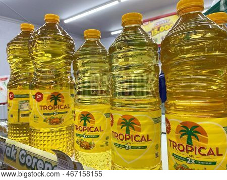 Makassar - Indonesia, 2022-12-13. cooking oil is displayed in a shop window or supermarket