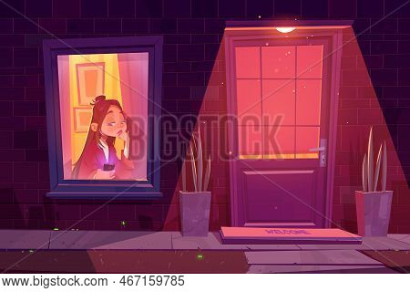 Lonely Sad Girl Sitting Alone At Window With Phone In Hand Waiting Call Or Sms Or Boring. Night Stre