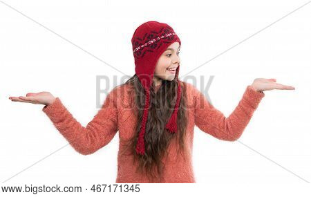 Earflap Hat Knitwear. Teen Girl Presenting Product In Earflap Hat. Teen Girl In Earflap Hat