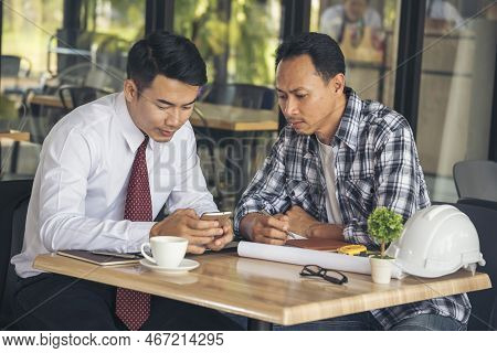 Asian Engineer Man Brainstorming Construction Building Contractor Civil Worker Parners Team Meeting