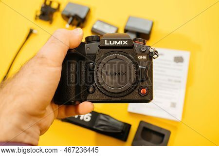 Paris, France - Nov 20, 2022: Photographer Holding Camera - Testing New Panasonic Lumix Dmc-gh6 Micr
