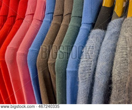 Cashmere Sweaters And Mohair Sweaters On A Clothes Rack