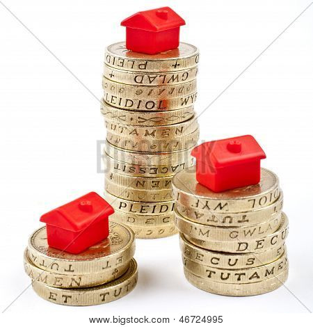 ï¿½1 Coins Stacked In Three Piles