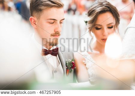Wedding Couple Bide And Groom Get Married In A Church