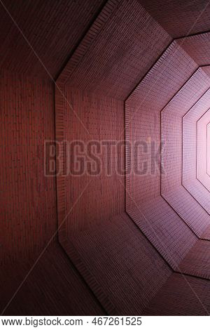 A Orange Caravista Building Taken From Below