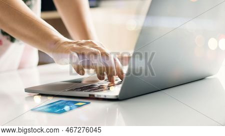 Hands Online Shopping With Credit Card On Laptop. Raising Of E Commerce Develop Secure Payment Proce