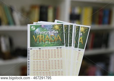 Minas Gerais, Brazil - December 16, 2022: Mega Da Virada Caixa Lottery Tickets
