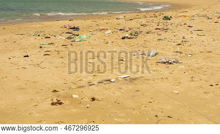 Warang, Mbour, Senegal - Circa January 20222. Beach Sand Of Atlantic Ocean With So Many Garbage Plas