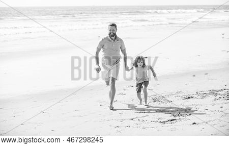 Fathers Or Family Day. Daddy With Kid Boy On Summer Day. Dad And Child Having Fun Outdoor