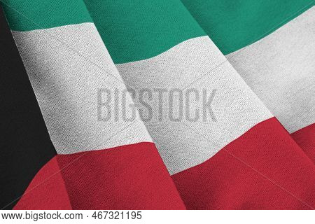 Kuwait Flag With Big Folds Waving Close Up Under The Studio Light Indoors. The Official Symbols And 