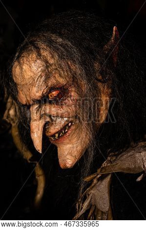 Cesky Krumlov, Czech Republic - December 4 2022: Krampus Or Cert Mask Of A Witch Face In Czechia.