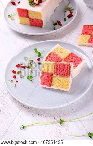 Slices Of Battenberg Cake, Traditional British Dessert With Two-colored Sponge Cake Wrapped In Marzi