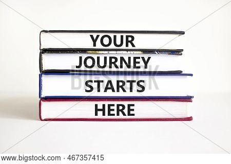 Your Journey Starts Here Symbol. Concept Words Your Journey Starts Here On Books On A Beautiful Whit