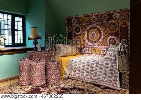 London - November 30, 2022: Liberty's, Luxury Department Store. Interior With A Bed, A Red Patchwork