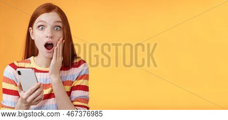 Concerned Shocked Emotive Redhead Girl Find Out Stunning News Look Camera Drop Jaw Gasping Impressed