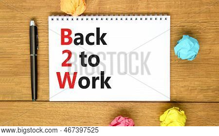 B2w Back To Work Symbol. Concept Words B2w Back To Work On White White Note On A Beautiful Wooden Ba